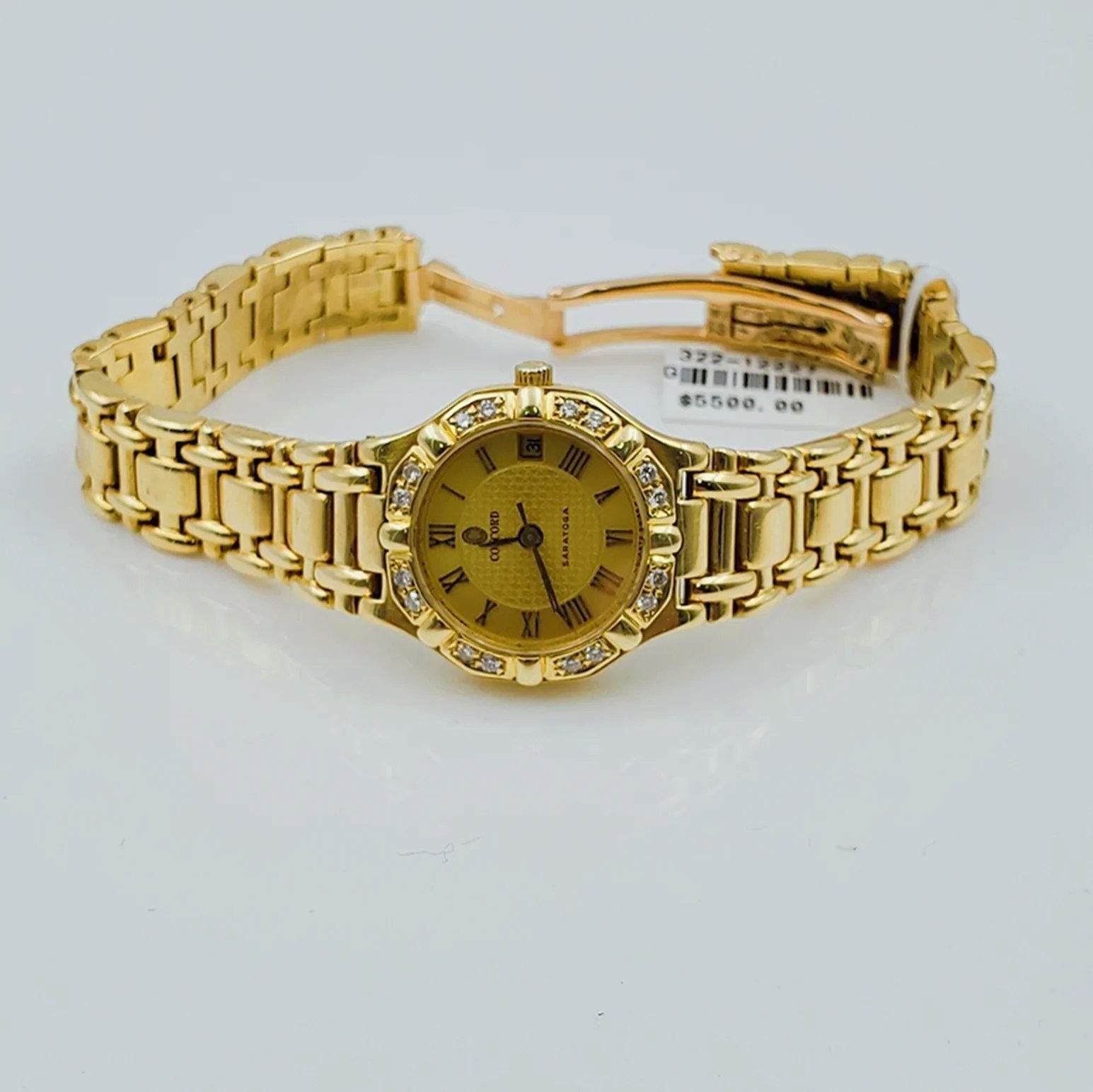 Ladies Concord Sarento 24mm Solid 18K Yellow Gold Wristwatch with Roman Numeral Gold Dial & Diamond Bezel. (Pre-Owned)