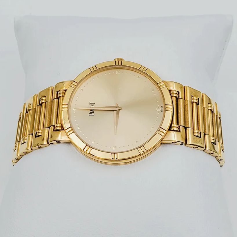 *Men's Piaget 31mm Dancer Vintage Solid 18K Yellow Gold Wristwatch with Champagne Dial. (Pre-Owned)