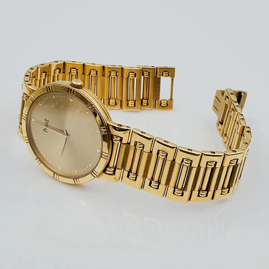 *Men's Piaget 31mm Dancer Vintage Solid 18K Yellow Gold Wristwatch with Champagne Dial. (Pre-Owned)