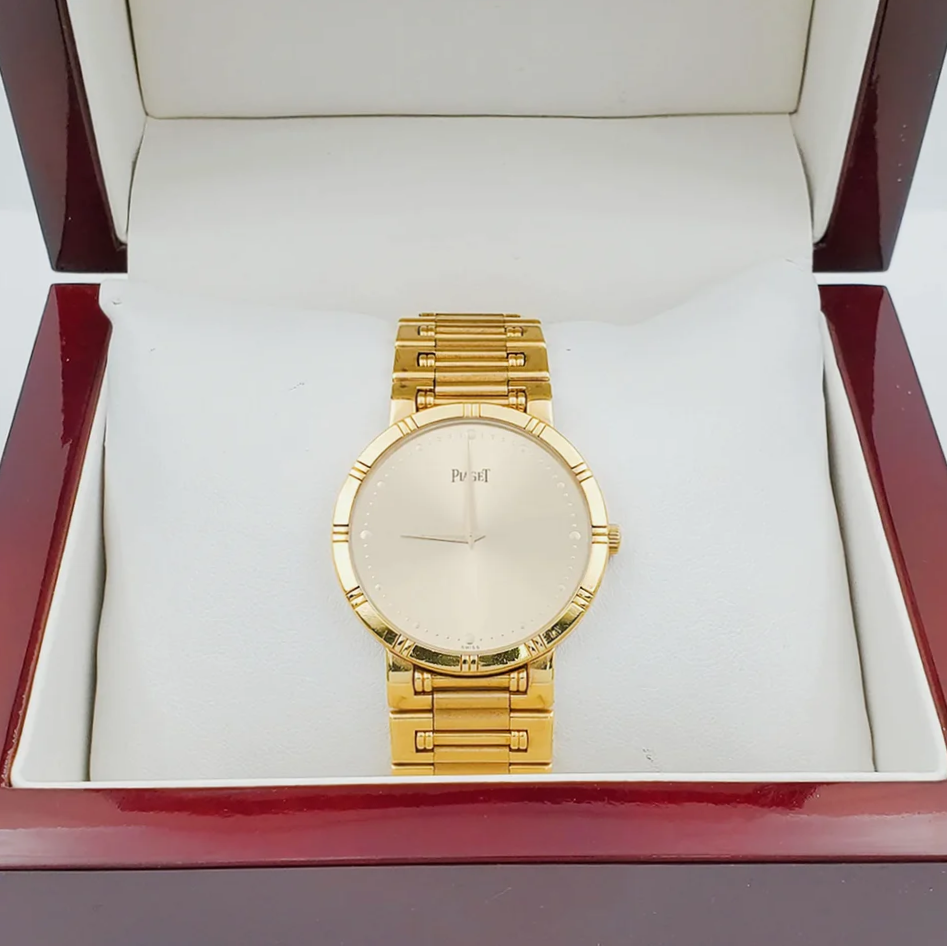 *Men's Piaget 31mm Dancer Vintage Solid 18K Yellow Gold Wristwatch with Champagne Dial. (Pre-Owned)