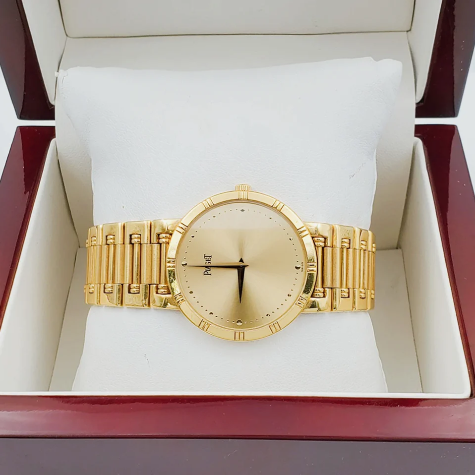 *Men's Piaget 31mm Dancer Vintage Solid 18K Yellow Gold Wristwatch with Champagne Dial. (Pre-Owned)