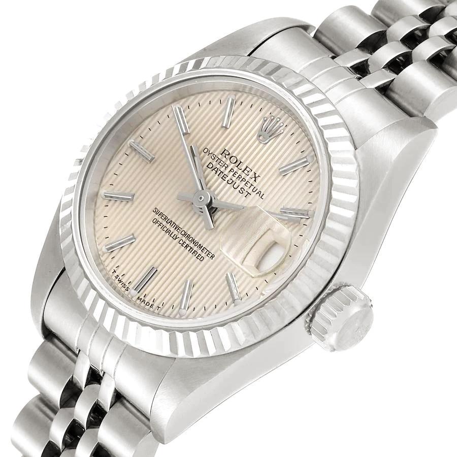 Ladies Rolex 26mm DateJust Stainless Steel Wristwatch w/ Silver Tapestry Dial & Fluted Bezel. (Pre-Owned 69174)